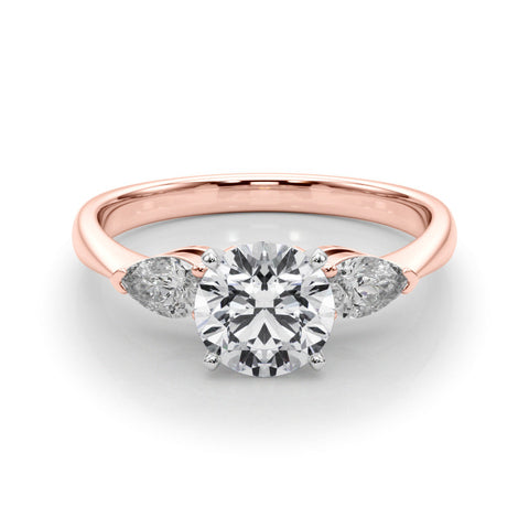 Rose gold Three-Stone Round Diamond Ring with Pear Side Stones in Four-Prong Setting