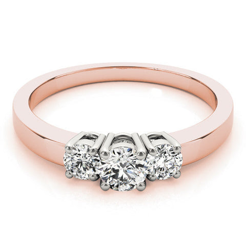 Rose gold Three-Stone Round Diamond Solitaire Ring with Channel Set Band and Four-Prong Setting