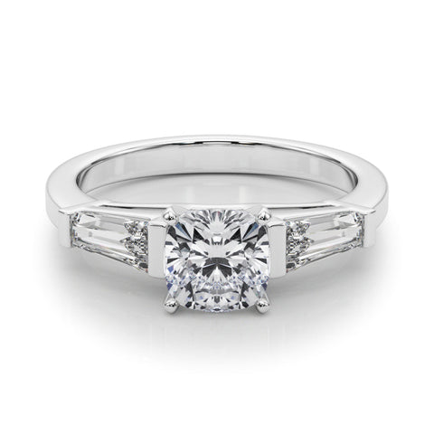 Platinum Cushion Cut Diamond Solitaire Ring with Tapered Baguette Accents and Four-Prong Setting