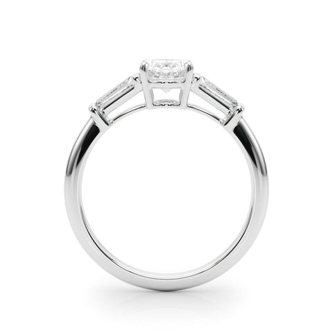 Platinum Oval Cut Diamond Ring with Tapered Baguette Side Stones in Four-Prong Setting