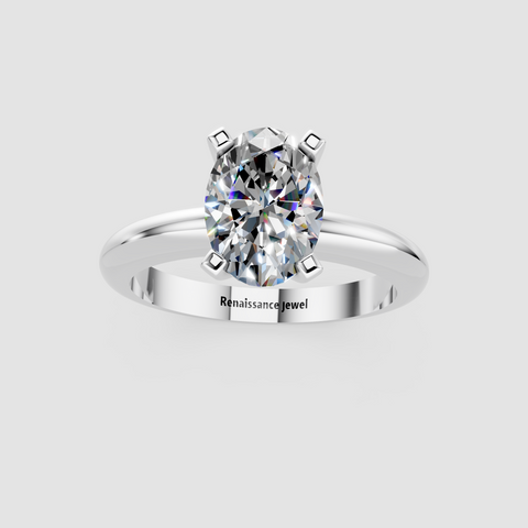 White gold Oval Cut Solitaire Engagement Ring with Round Band and Four-Prong Setting