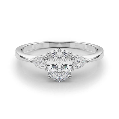 White gold Oval Cut Three-Stone Diamond Ring with Pear Side Stones on a Classic Solitaire Band with Prong Setting