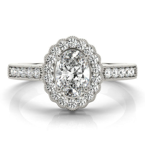 Platinum Oval Halo Diamond Ring with Pavé Band and Four-Prong Setting