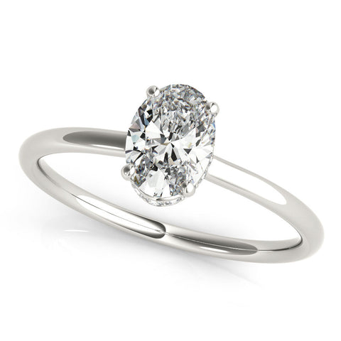 Platinum Oval Solitaire Diamond Ring with Thin Band and Four-Prong Setting