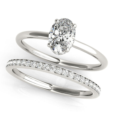 Platinum Oval Solitaire Diamond Ring with Thin Band and Four-Prong Setting