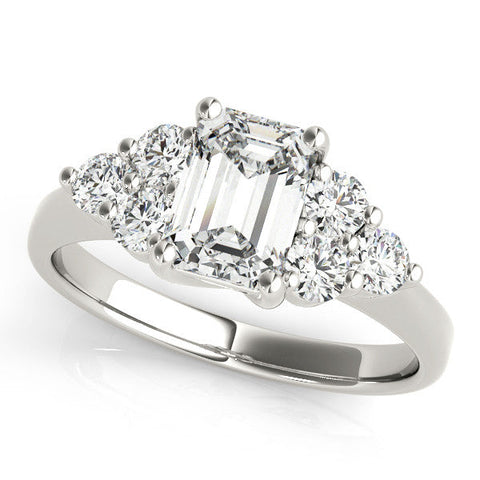 Platinum Radiant Cut Diamond Cluster Ring with Round Accent Stones and Prong Setting on a Classic Band