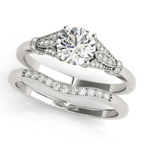 White gold Round Brilliant Solitaire with Pave Band and Four-Prong Setting