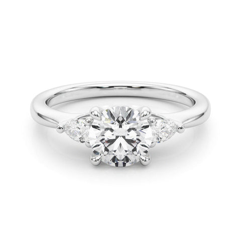 Platinum Round Brilliant Three-Stone Ring with Pear Side Stones and Four-Prong Setting