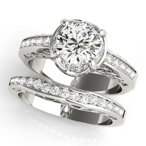 Platinum Round Cut Halo Diamond Ring with Channel Set Band and Four-Prong Setting
