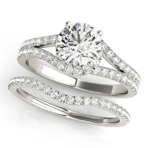 White gold Round Cut Solitaire Diamond with Pavé Twist Band and Four-Prong Setting