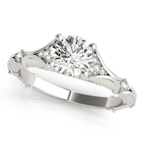 Platinum Round Cut Solitaire Engagement Ring with Pave Band and Four-Prong Setting