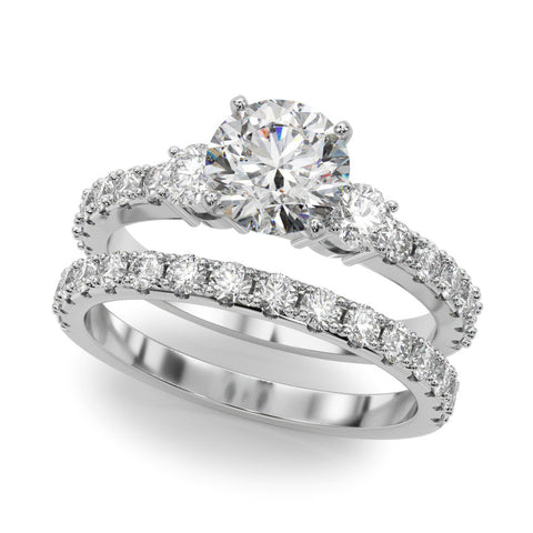 Platinum Round Cut Three-Stone Diamond Pavé Band with Prong Setting