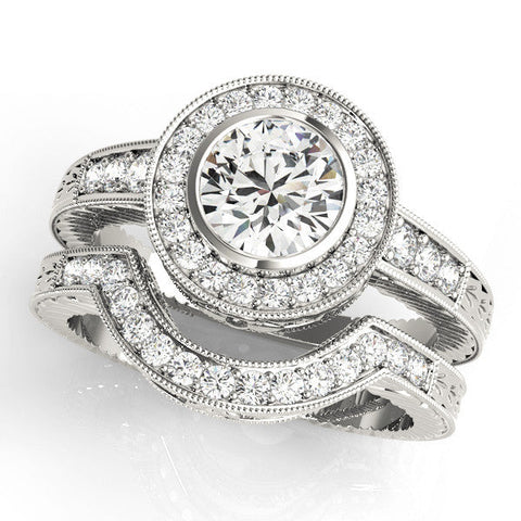 Platinum Round Halo Bezel Set Diamond Ring with Pavé Band