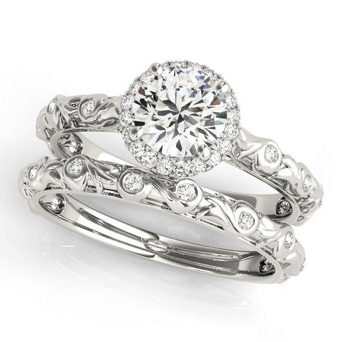 White gold Round Halo Diamond Solitaire with Filigree Band and Four-Prong Setting
