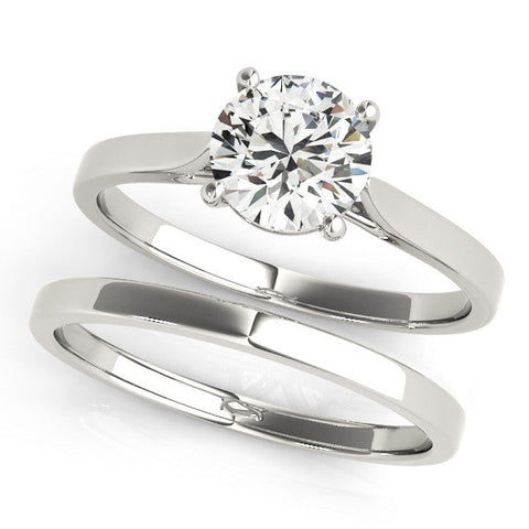 White gold Round Solitaire Diamond Ring with Four-Prong Setting and Tapered Band