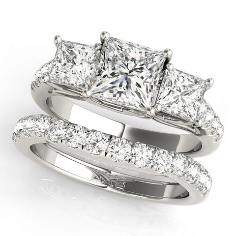 Platinum Three-Stone Princess Cut Diamond Ring with Pavé Band and Prong Setting