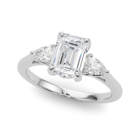 Platinum Three-Stone Emerald Cut Diamond Ring with Pear Side Stones in Four-Prong Setting