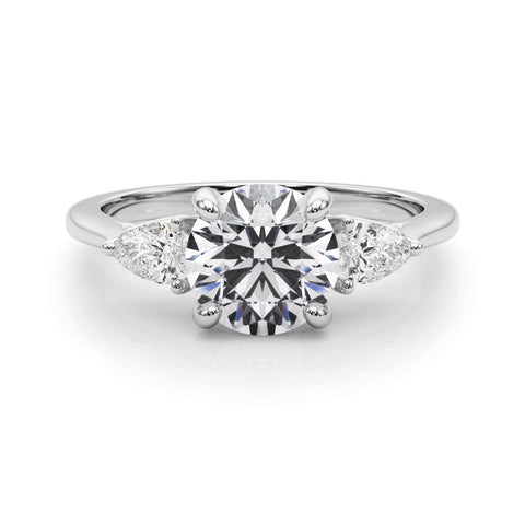 Platinum Three-Stone Round Brilliant Diamond Solitaire Ring with Tapered Band and Four-Prong Setting