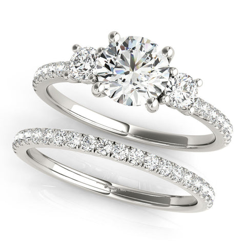Platinum Three-Stone Round Cut Diamond Pavé Band with Prong Setting