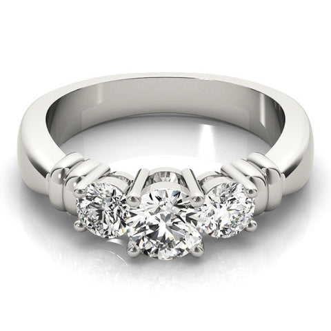 Platinum Three-Stone Round Cut Diamond Ring with Channel Band and Prong Setting