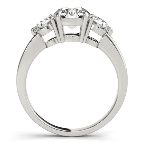 Platinum Three-Stone Round Cut Solitaire Ring with Prong Setting on a Classic Band