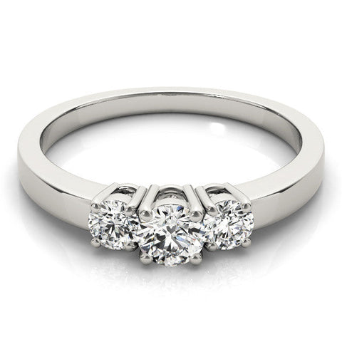 Platinum Three-Stone Round Diamond Solitaire Ring with Channel Set Band and Four-Prong Setting