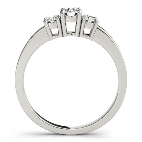 Platinum Three-Stone Round Diamond Solitaire Ring with Channel Set Band and Four-Prong Setting