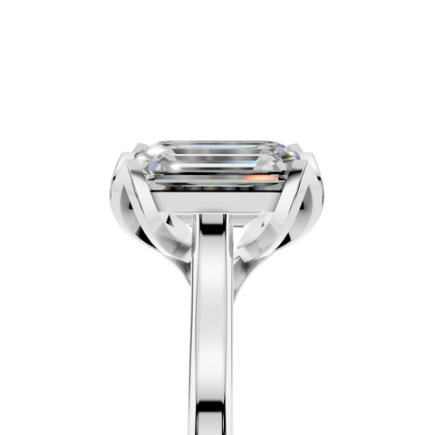 White gold Emerald Cut Solitaire Diamond Ring with Flower-Prong Setting and Classic Band