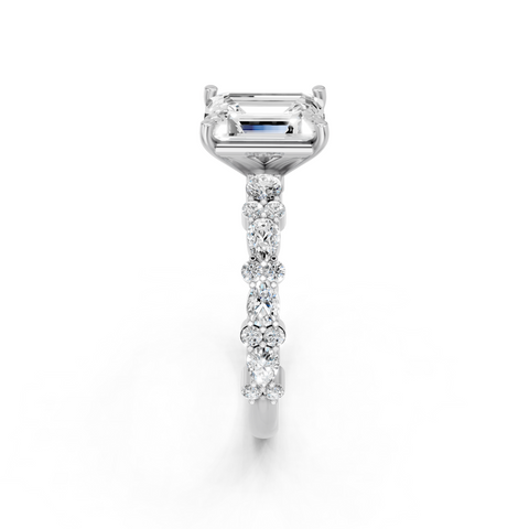 Platinum Emerald Solitaire with Side Stones, Pave Band, Four-Prong Setting