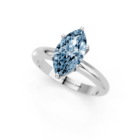 Silver Fancy Blue Marquise  Cut Solitaire Engagement Ring with Round Band and Four-Prong Setting