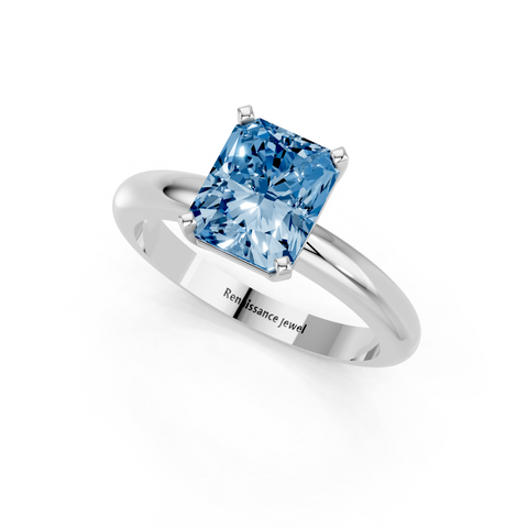 White gold Fancy Blue Radiant  Cut Solitaire Engagement Ring with Round Band and Four-Prong Setting