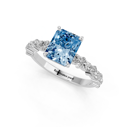 Platinum Fancy Blue Radiant  Solitaire with Side Stones, Pave Band, Four-Prong Setting