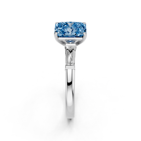Platinum Fancy Blue Radiant  Solitaire with Tapered Baguette Side Stones on a Classic Band with Four-Prong Setting