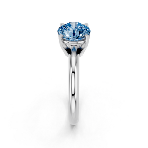 White gold Fancy Blue Round  Cut Solitaire Engagement Ring with Round Band and Four-Prong Setting