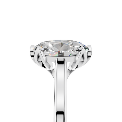 Platinum Oval Cut Solitaire Diamond Ring with Flower-Prong Setting and Classic Band