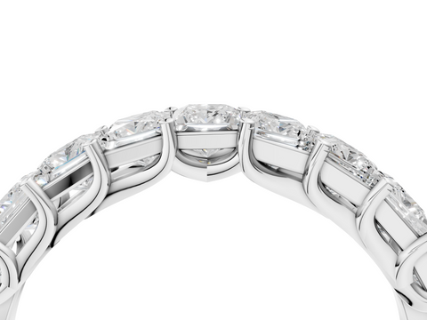 Platinum Princess Cut Diamond Channel Set Eternity Band with Prong Setting