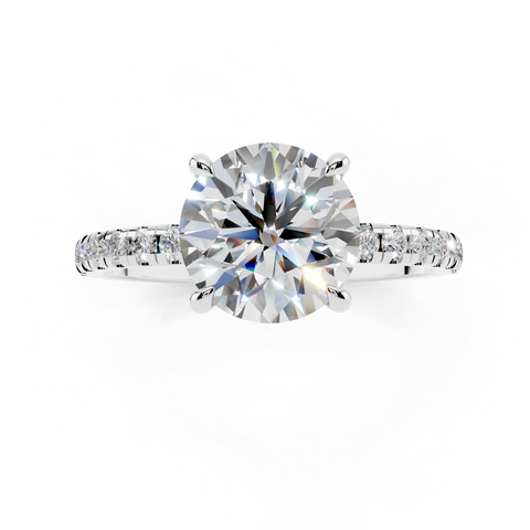 White gold Round Brilliant Solitaire with Pavé Band and Four-Prong Setting
