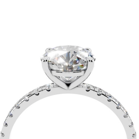 White gold Round Brilliant Solitaire with Pavé Band and Four-Prong Setting