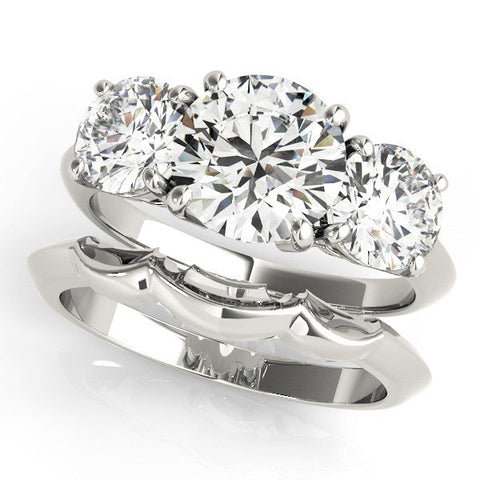 White gold Three-Stone Round Cut Diamond Engagement Ring with Prong Setting on a White Gold Band