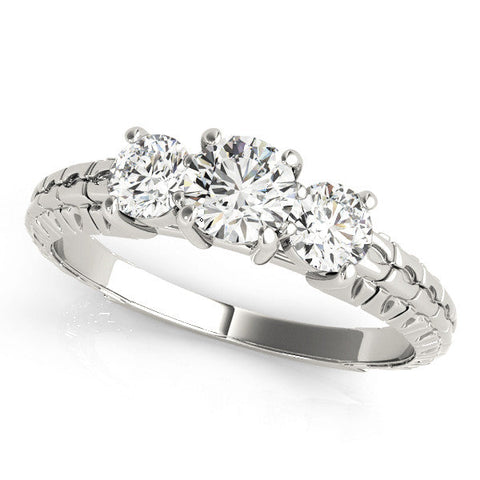 Platinum Three-Stone Round Cut Diamond Ring with Channel-Set Band and Prong Setting