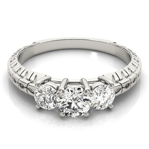Platinum Three-Stone Round Cut Diamond Ring with Channel-Set Band and Prong Setting