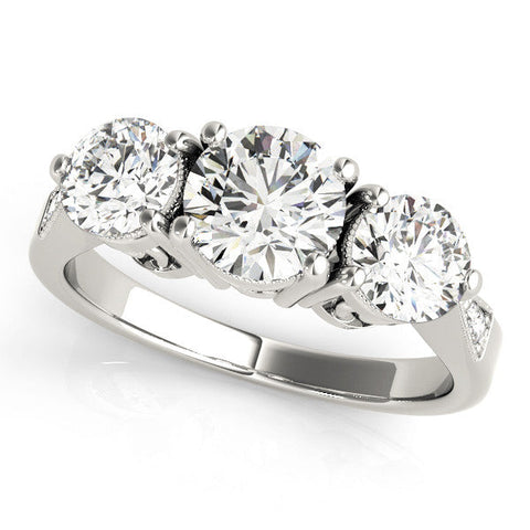Platinum Three-Stone Round Diamond Engagement Ring with Prong Setting on a Classic Band