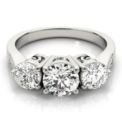 Platinum Three-Stone Round Diamond Engagement Ring with Prong Setting on a Classic Band