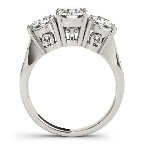 Platinum Three-Stone Round Diamond Engagement Ring with Prong Setting on a Classic Band