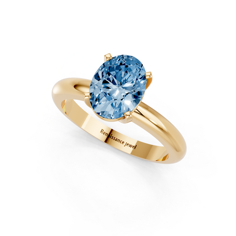 Yellow gold Fancy Blue Oval  Cut Solitaire Engagement Ring with Round Band and Four-Prong Setting