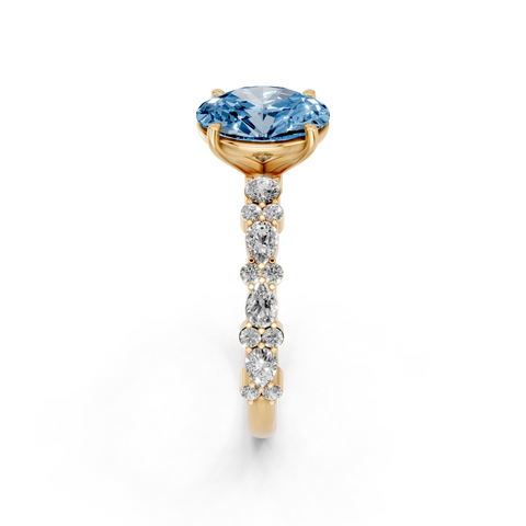 Yellow gold Fancy Blue Oval  Solitaire with Side Stones, Pave Band, Four-Prong Setting