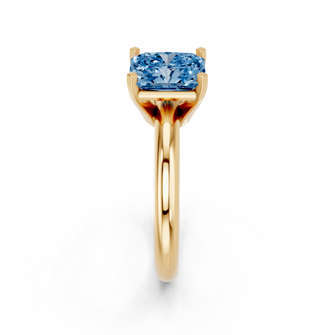 Yellow gold Fancy Blue Radiant  Cut Solitaire Engagement Ring with Round Band and Four-Prong Setting