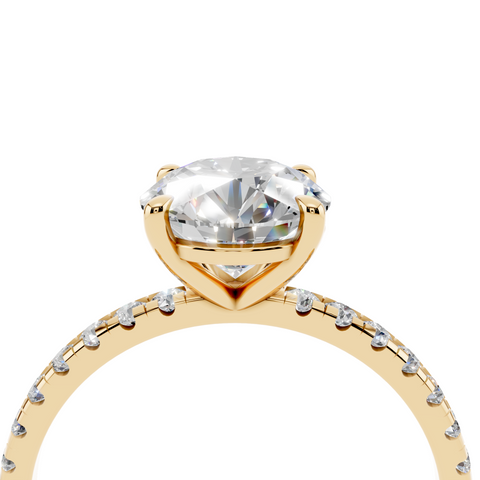 Yellow gold Round Brilliant Solitaire with Pavé Band and Four-Prong Setting