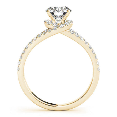 Yellow gold Round Cut Solitaire Diamond with Pavé Twist Band and Four-Prong Setting