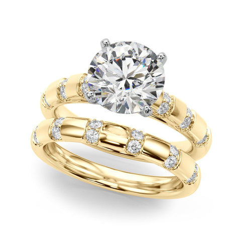 Yellow gold Round Solitaire Diamond Ring with Channel Set Band and Four-Prong Setting